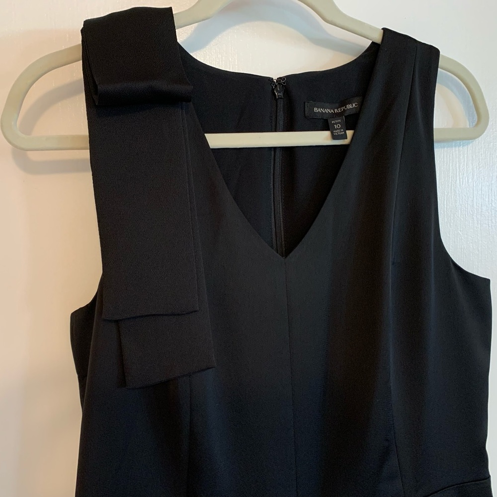 Black satin jumpsuit.
